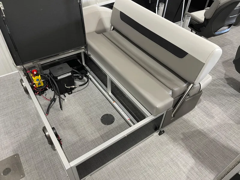Slide: The Image of 2025 Princecraft Vectra 25 RL boat interior with open storage compartment and seating. - 5
