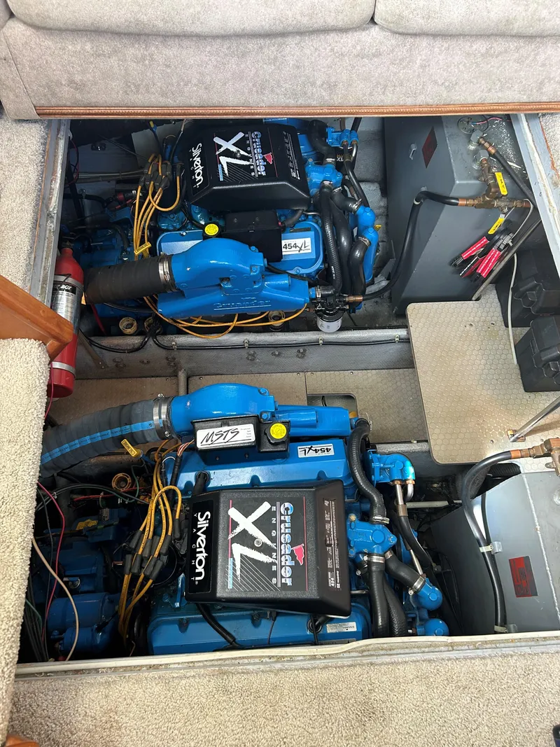 Slide: The Image of 1993 Silverton 34 Aft Cabin Motor Yacht engine room with twin engines. - 21