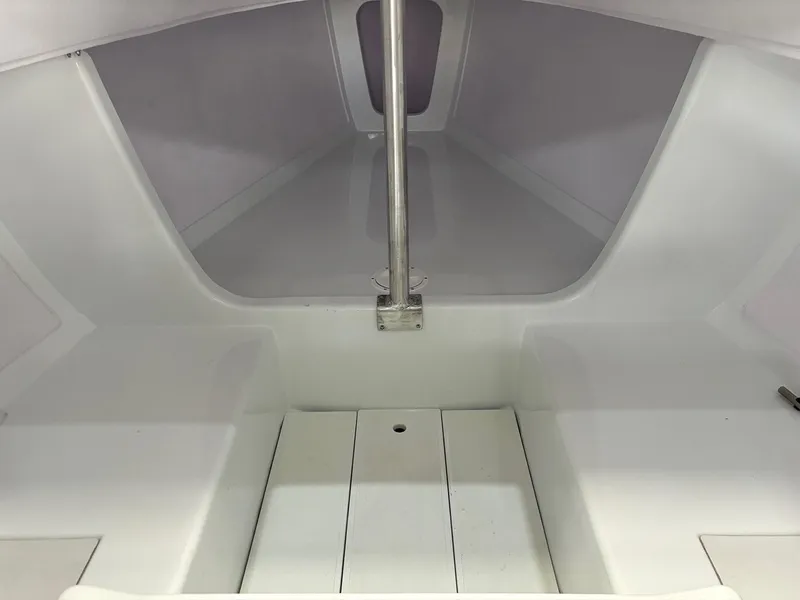 Slide: The Image of Interior of 2025 J Boats J 7, featuring sleek, minimalist design and white finish. - 8