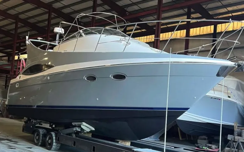 Slide: The Image of 1997 Carver 350 Mariner yacht in a storage facility. - 3