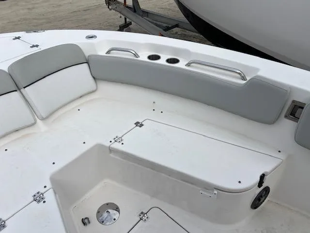 Slide: The Image of 2021 Sea Fox 248 Commander boat interior with seating and storage compartments. - 10
