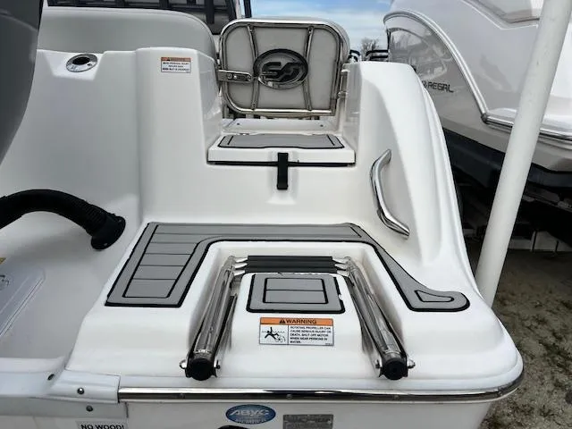 Slide: The Image of 2021 Sea Fox 248 Commander boat with swim platform and ladder. - 2