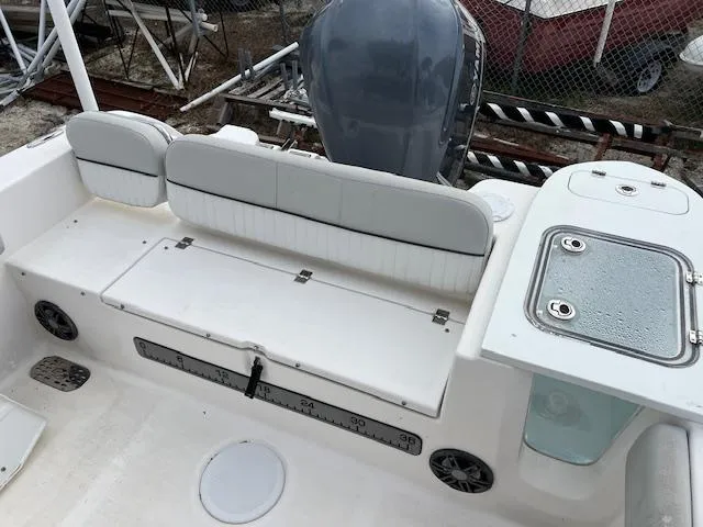 Slide: The Image of 2021 Sea Fox 248 Commander boat interior with seating and storage compartments. - 3