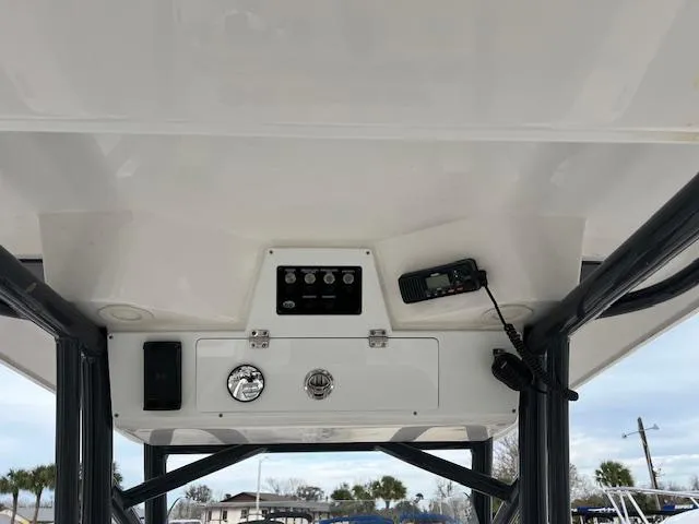 Slide: The Image of 2021 Sea Fox 248 Commander boat console with radio and controls. - 4