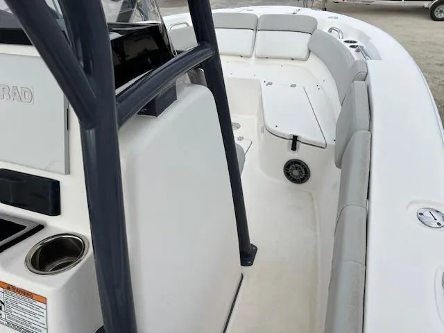 Slide: The Image of 2021 Sea Fox 248 Commander boat interior with seating and console. - 5