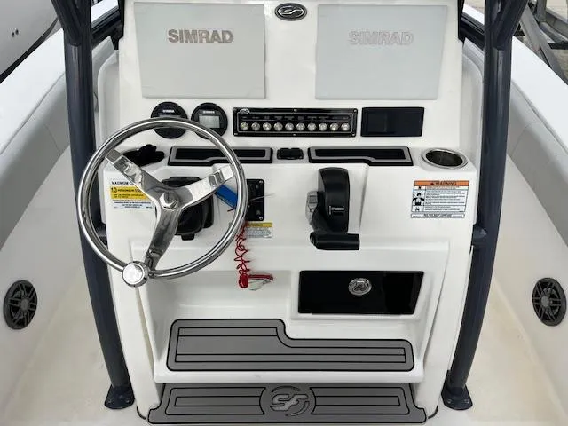 Slide: The Image of 2021 Sea Fox 248 Commander helm with Simrad electronics and steering wheel. - 6