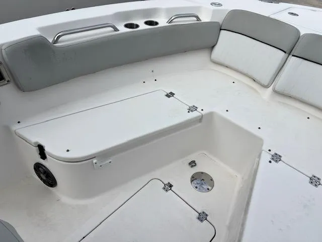 Slide: The Image of 2021 Sea Fox 248 Commander boat interior with seating and storage compartments. - 8