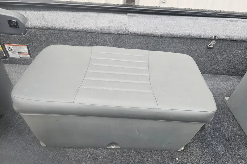 Slide: The Image of Gray cushioned seat in 2019 Tracker Panfish 16 boat interior. - 8