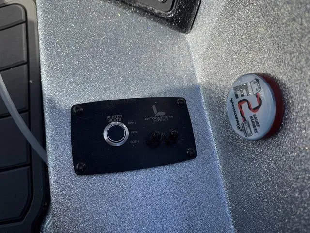 Slide: The Image of Control panel and gauge in 2025 Phoenix 21 XE boat interior. - 19