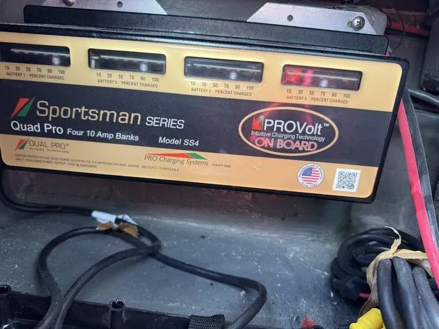 Slide: The Image of Sportsman Series Quad Pro battery charger with ProVolt technology, model SS4, in a Phoenix 21 XE. - 23