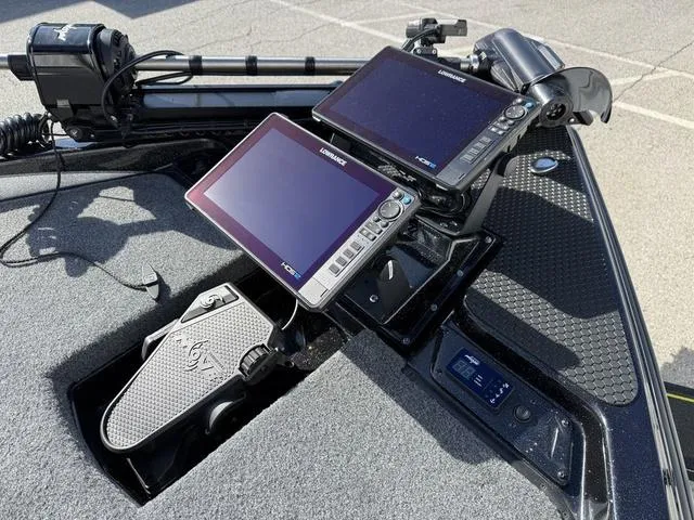 Slide: The Image of Phoenix 21 XE 2025 boat dashboard with dual Lowrance displays and foot pedal. - 9