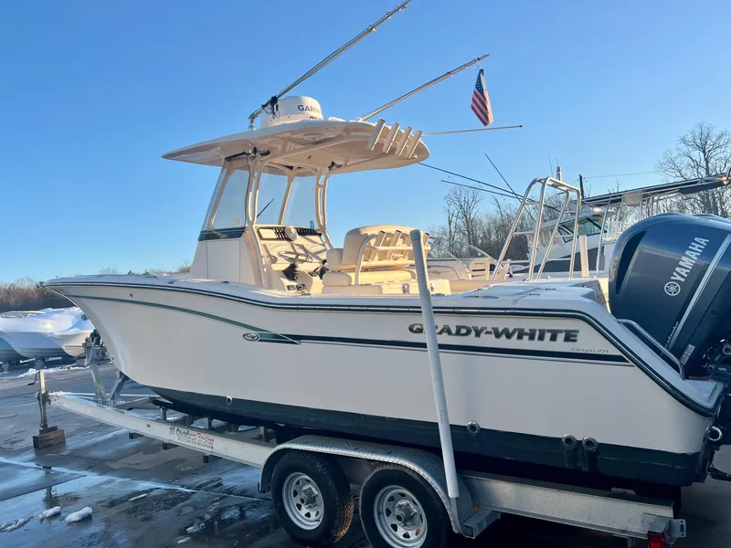 Slide: The Image of 2018 Grady-White Canyon 271 FS boat on trailer with Yamaha engine. - 0