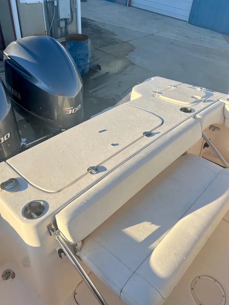 Slide: The Image of 2018 Grady-White Canyon 271 FS boat with dual Yamaha engines. - 12