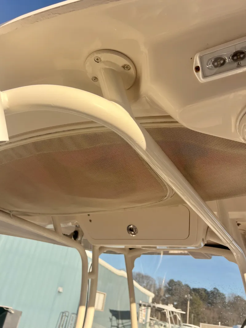 Slide: The Image of 2018 Grady-White Canyon 271 FS boat canopy and structure detail. - 16