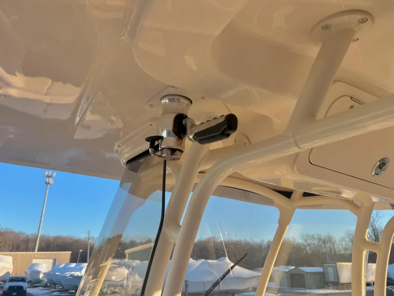 Slide: The Image of 2018 Grady-White Canyon 271 FS boat interior with mounted equipment. - 18