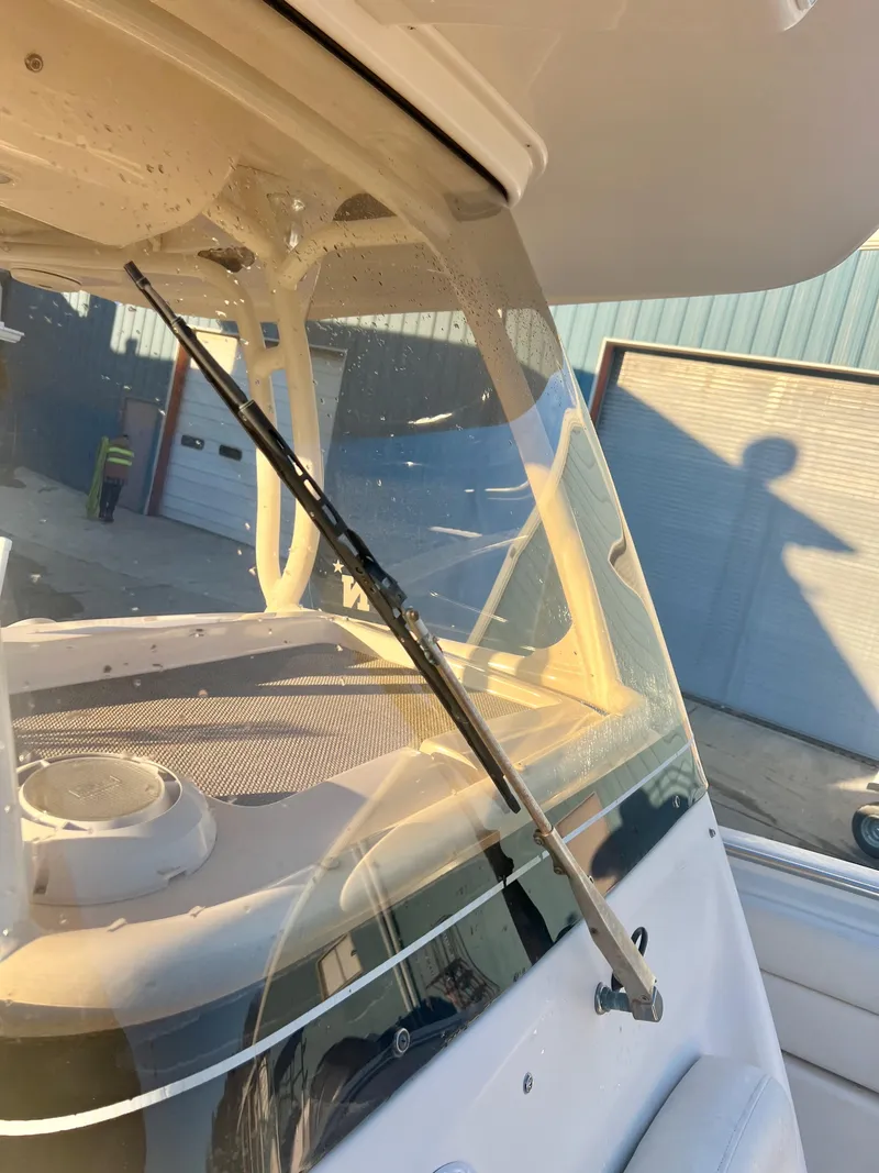 Slide: The Image of 2018 Grady-White Canyon 271 FS boat windshield and wiper detail. - 39