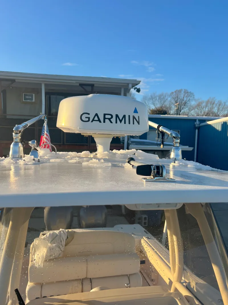 Slide: The Image of 2018 Grady-White Canyon 271 FS with Garmin radar on top. - 42