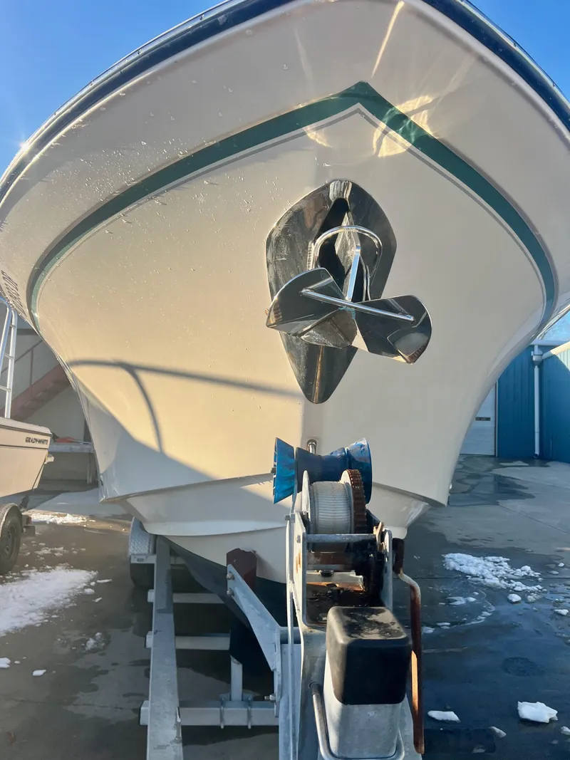 Slide: The Image of 2018 Grady-White Canyon 271 FS boat on trailer, front view. - 5