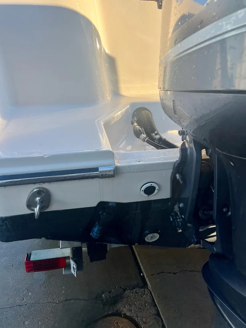 Slide: The Image of 2018 Grady-White Canyon 271 FS boat stern and engine detail. - 6