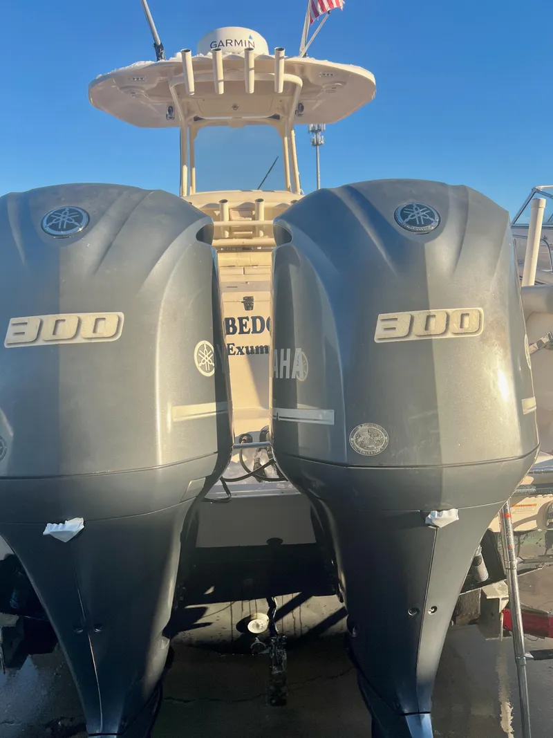 Slide: The Image of 2018 Grady-White Canyon 271 FS with twin Yamaha 300 engines. - 7