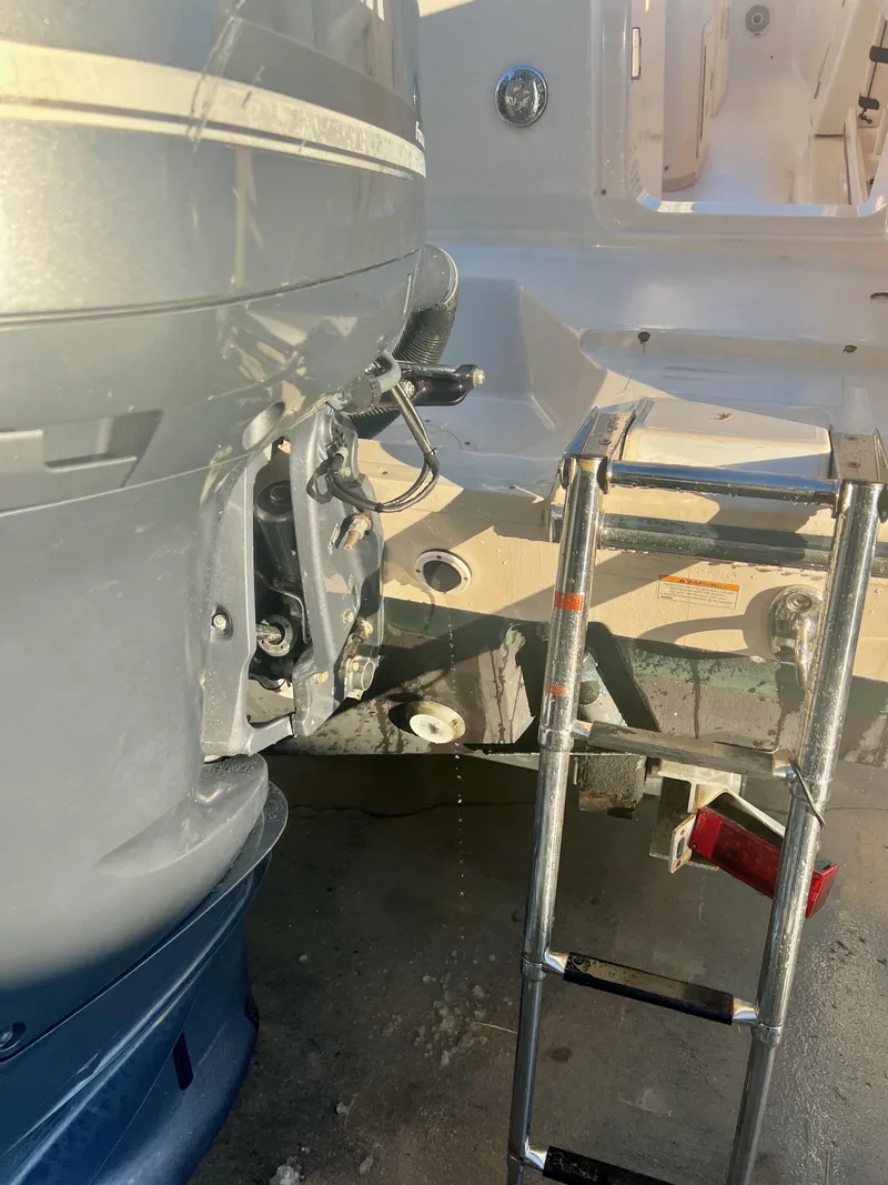 Slide: The Image of 2018 Grady-White Canyon 271 FS boat with ladder and motor detail. - 8
