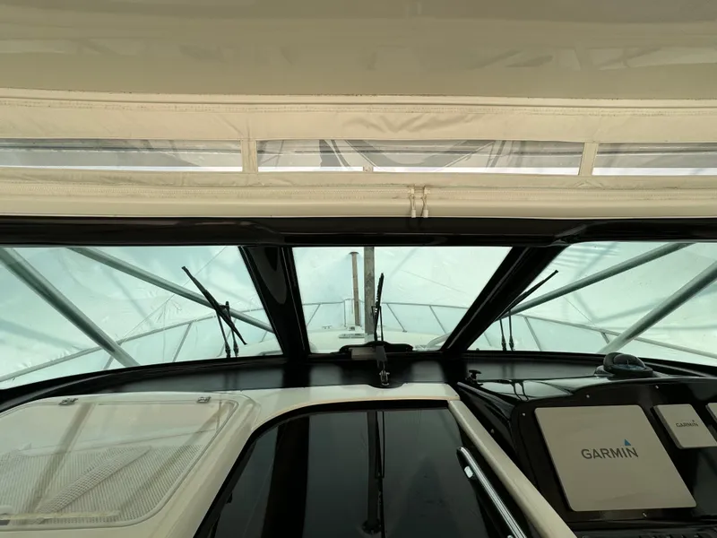 Slide: The Image of 2004 Tiara Yachts 4200 Open helm with Garmin navigation system. - 22