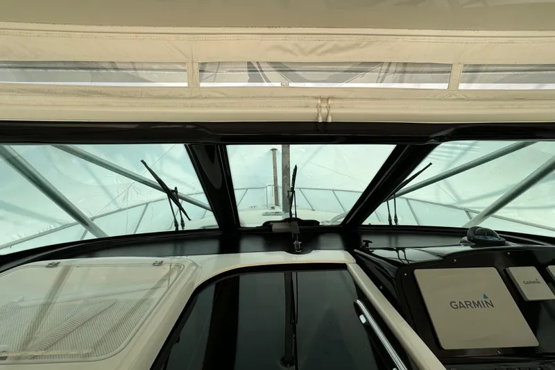 Slide: The Image of Interior view of 2004 Tiara Yachts 4200 Open with Garmin navigation system. - 24