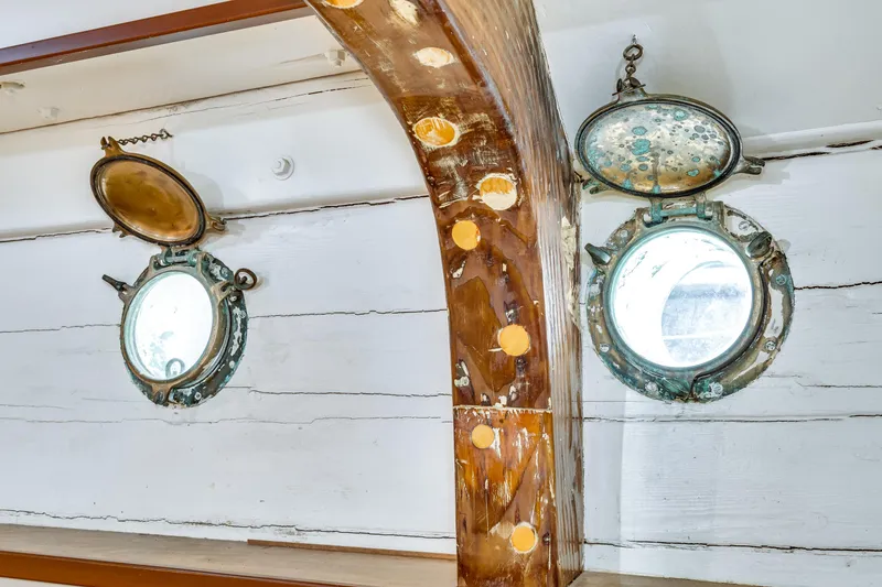 Slide: The Image of 1941 Custom Sagstad Fantail interior with vintage portholes and wooden beam. - 49