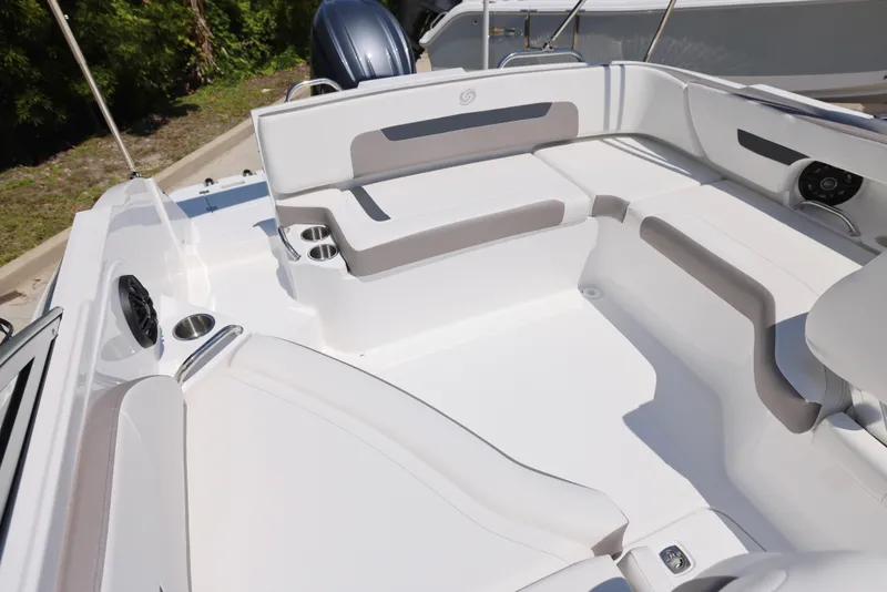 Slide: The Image of 2025 Hurricane SunDeck 235 OB boat interior with spacious seating and modern design. - 11