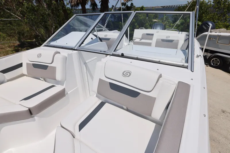 Slide: The Image of 2025 Hurricane SunDeck 235 OB boat with spacious seating and sleek design. - 21