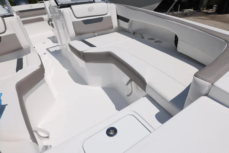 Slide: The Image of 2025 Hurricane SunDeck 235 OB interior with spacious seating and modern design. - 22