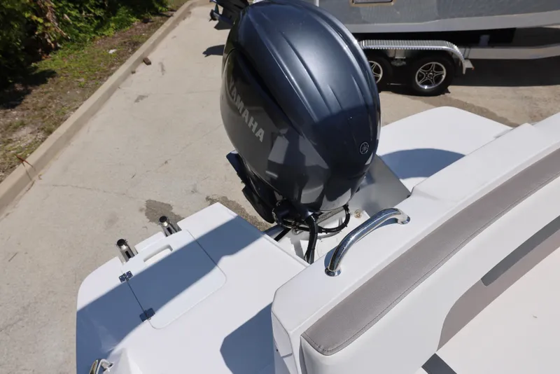 Slide: The Image of 2025 Hurricane SunDeck 235 OB boat with Yamaha outboard motor, viewed from above. - 7