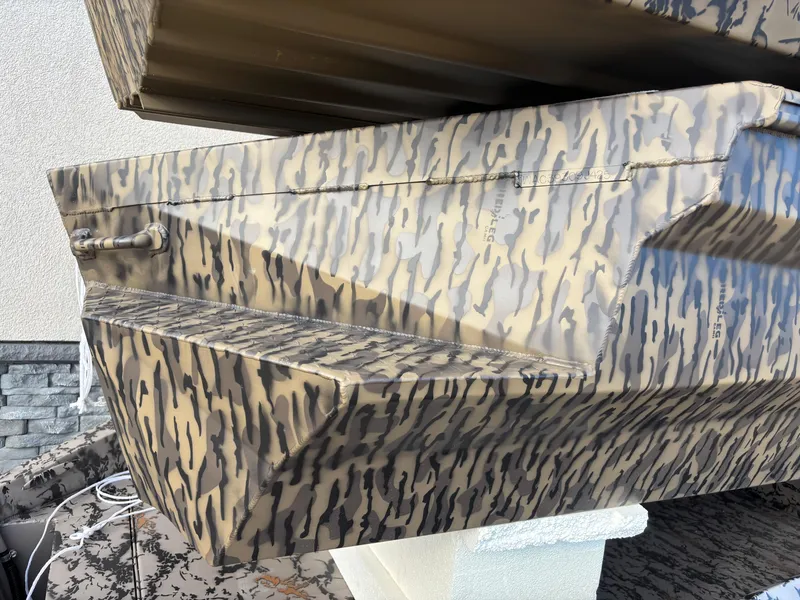 Slide: The Image of 2025 Edge Duck Boats 553 DB with camouflage pattern, showcasing rugged design. - 4