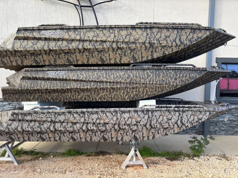 The Image of 2025 Edge Duck Boats 553 DB models stacked, featuring camouflage design. - 0