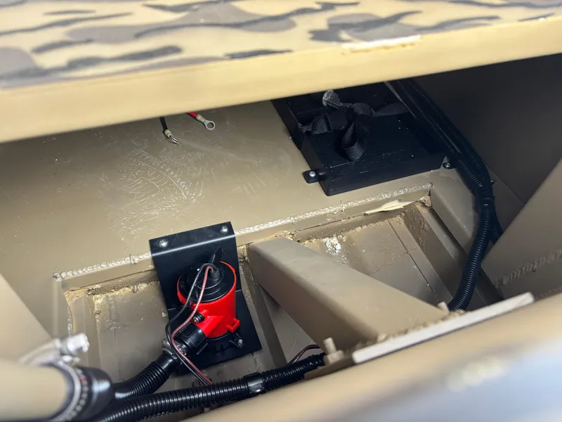 Slide: The Image of Interior view of 2025 Edge Duck Boats 553 DB, showcasing wiring and components. - 5