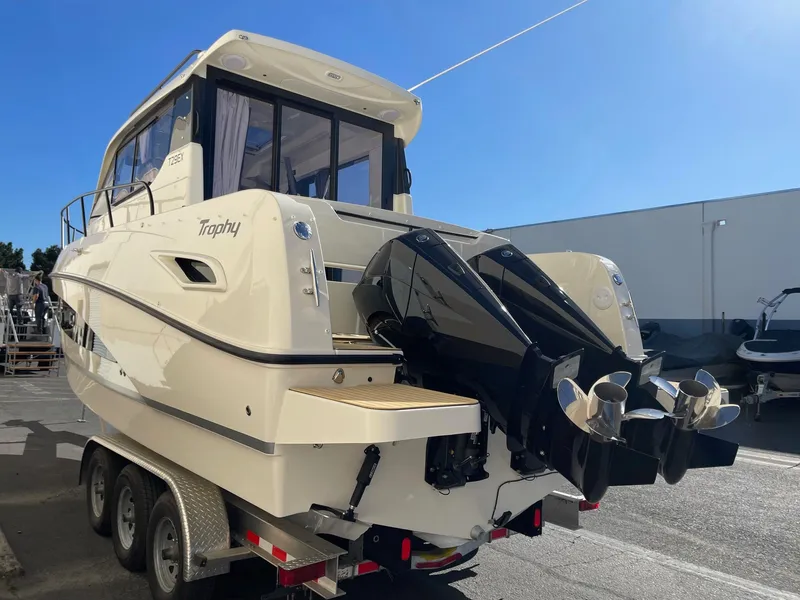 Slide: The Image of 2025 Bayliner Trophy T29 Explorer boat on trailer, rear view. - 5