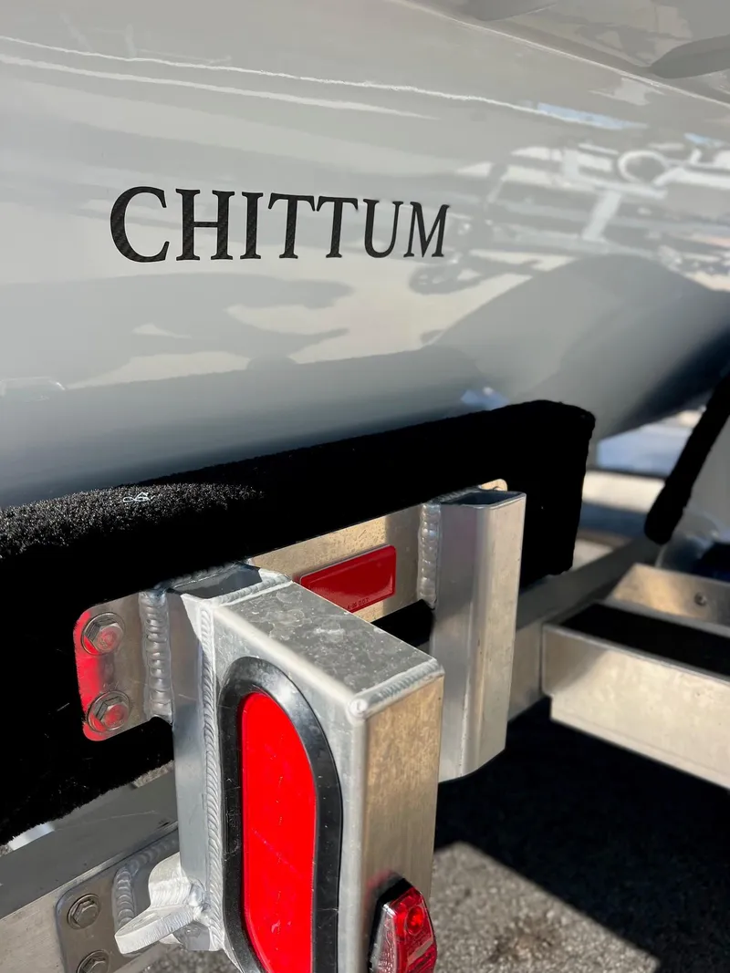Slide: The Image of 2024 Chittum Skiffs Islamorada 18 boat on trailer, close-up view. - 5