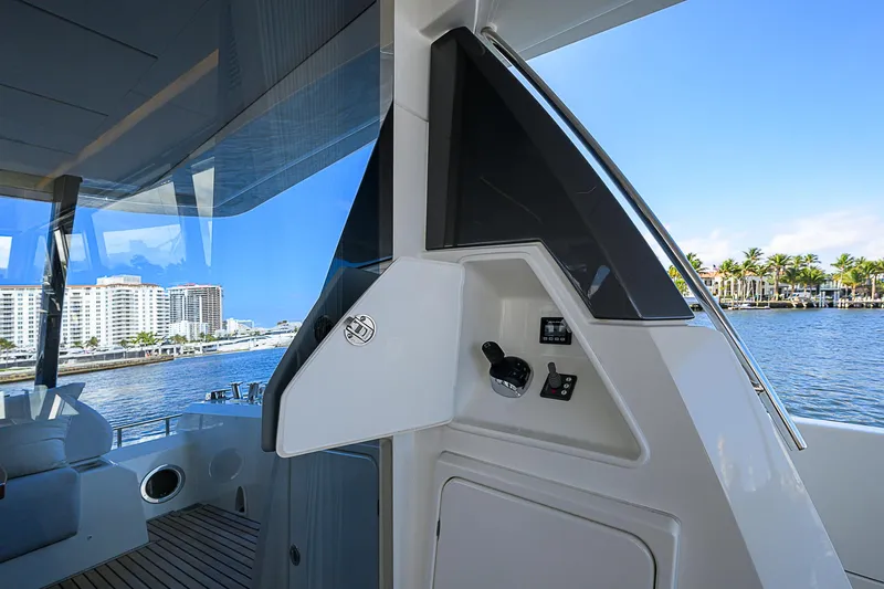 Slide: The Image of Prestige 690 yacht interior with waterfront view, 2021 model. - 25