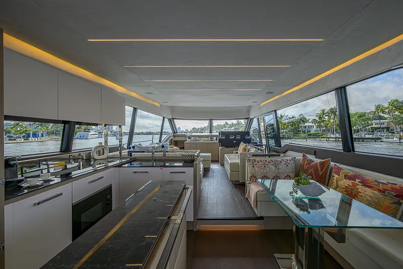 Slide: The Image of Luxurious interior of 2021 Prestige 690 yacht with modern kitchen and seating area. - 41