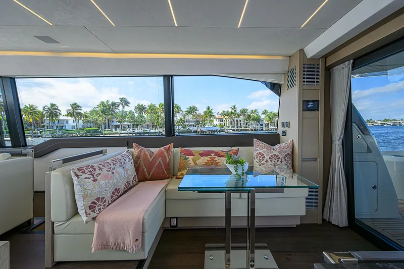 Slide: The Image of Luxurious interior of 2021 Prestige 690 yacht with elegant seating and waterfront view. - 48