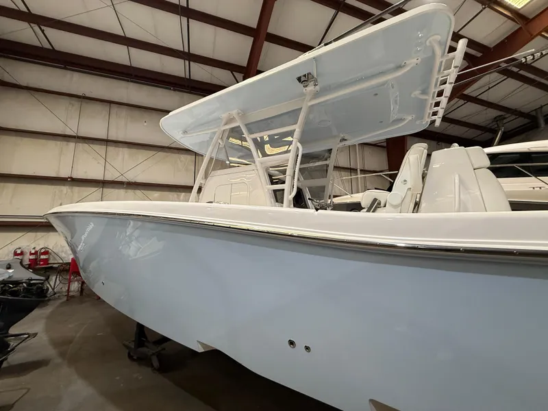 Slide: The Image of 2022 Invincible 39 Open Fisherman boat in storage facility. - 11
