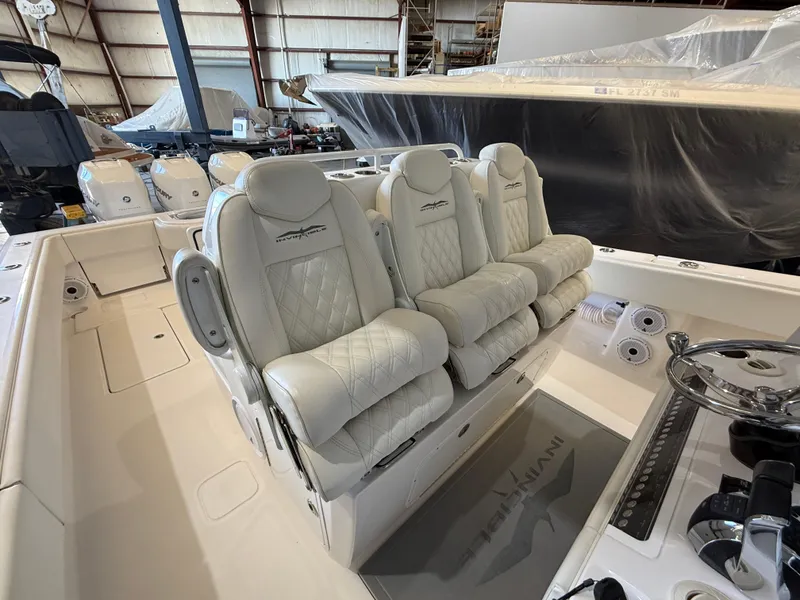 Slide: The Image of 2022 Invincible 39 Open Fisherman boat with luxurious seating in a spacious cockpit. - 17
