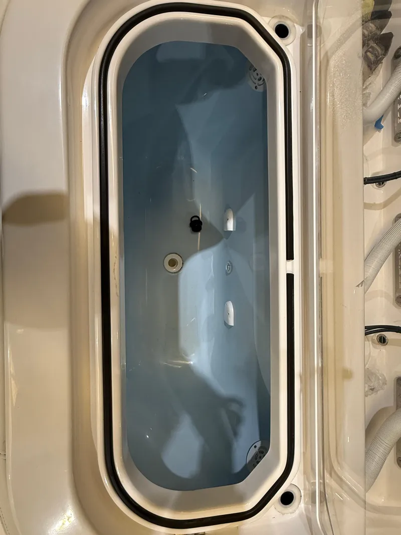 Slide: The Image of 2022 Invincible 39 Open Fisherman livewell interior, featuring a sleek, modern design. - 38