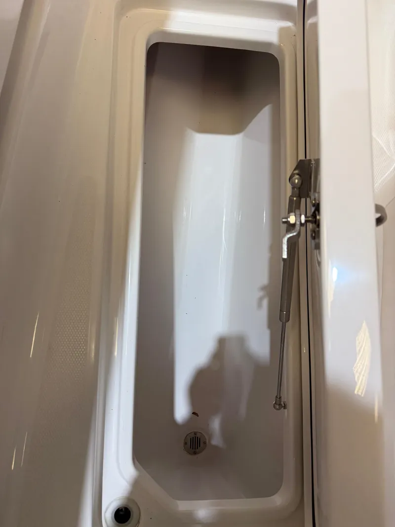Slide: The Image of Open storage compartment on 2022 Invincible 39 Open Fisherman boat. - 39