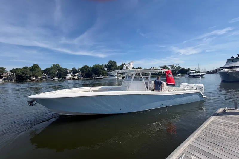 Slide: The Image of 2022 Invincible 39 Open Fisherman boat docked on a sunny day. - 6
