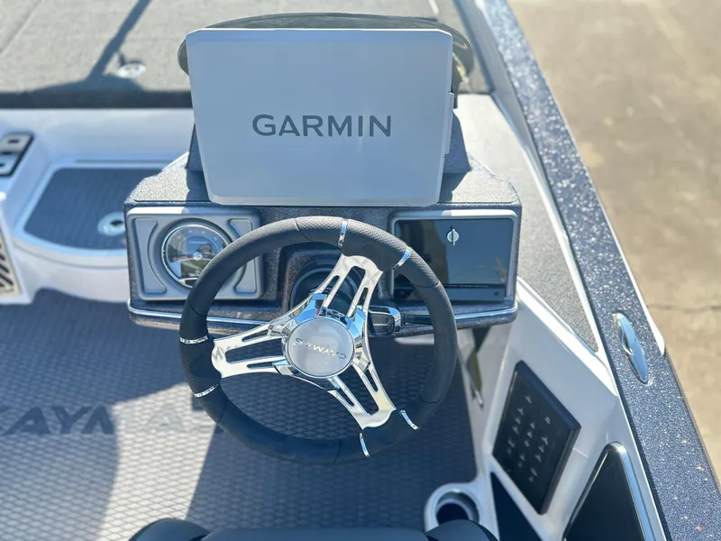 Slide: The Image of 2025 Caymas CX 20 PRO boat dashboard with Garmin navigation system. - 5