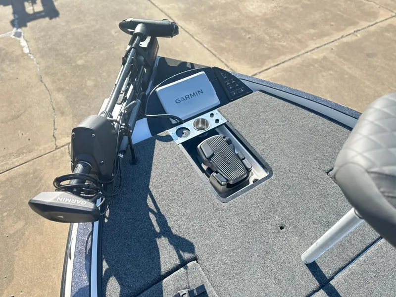 Slide: The Image of 2025 Caymas CX 20 PRO boat deck with Garmin equipment and foot pedal. - 7