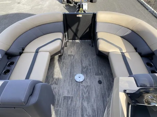 Slide: The Image of Viaggio x20u 2025 boat interior with beige seating and wood-style flooring. - 13