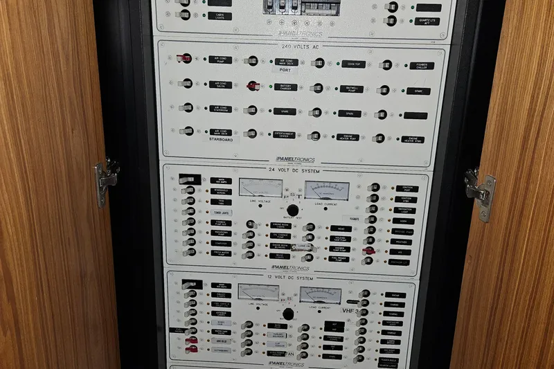 Slide: The Image of Electrical control panel on a 2001 Davis 45 Express boat. - 18