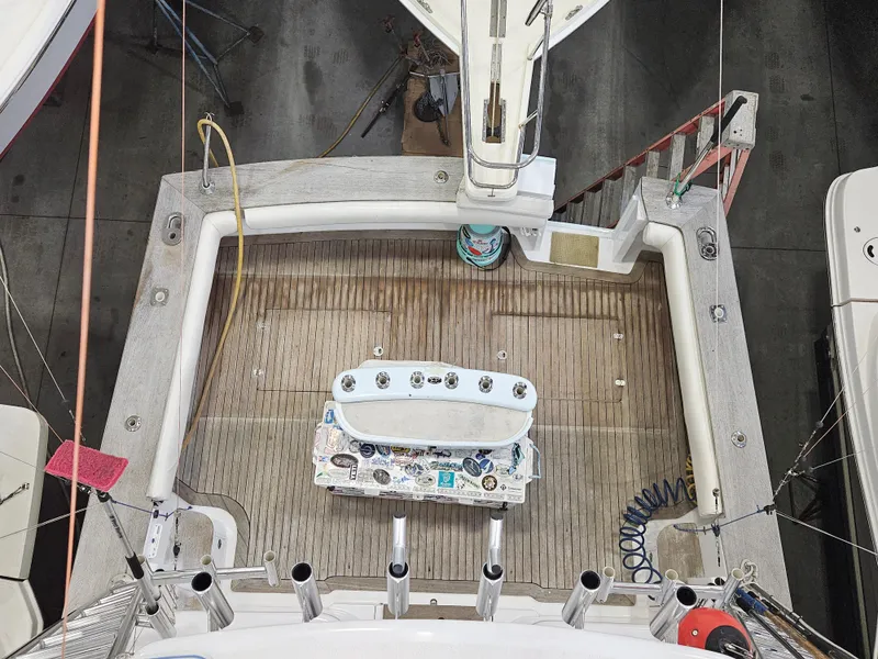 Slide: The Image of Aerial view of 2001 Davis 45 Express yacht deck with fishing equipment. - 19